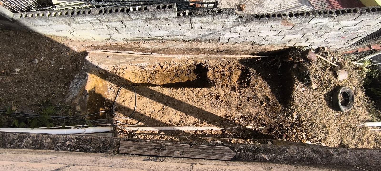 Foundation trench with plumbing